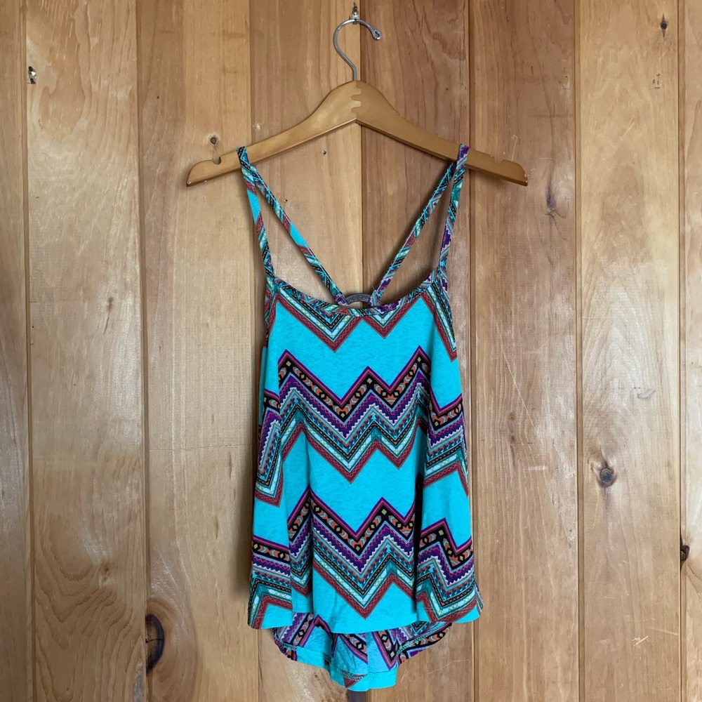 Sea-foam green tank top with colorful design